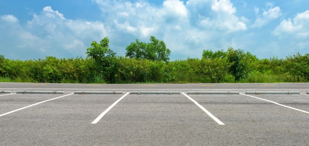 A close up view of parking lot spaces